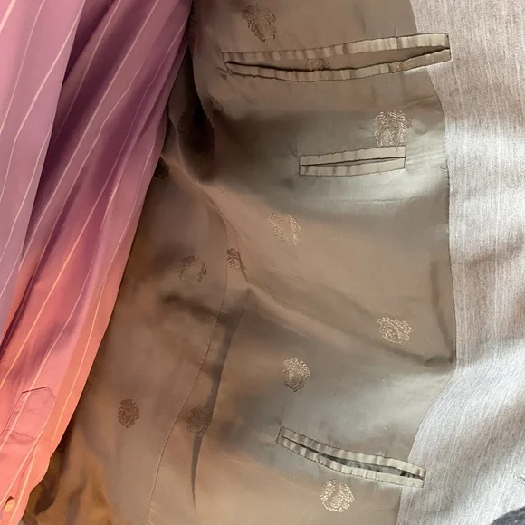 Light gray suit with baby blue pinstriped. 42L